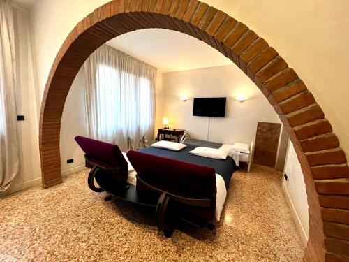 TV a/nebo společenská místnost v ubytování Locazione Turistica Joyful Padova