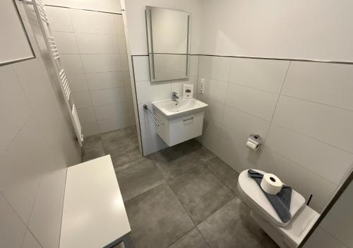 Koupelna v ubytování Nordsee Park Dangast Haus 6 Whg. 2 Strandläufer