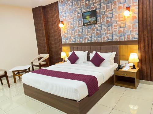 Ένα ή περισσότερα κρεβάτια σε δωμάτιο στο Hotel Floral Palace