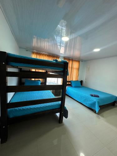 Postel nebo postele na pokoji v ubytování Hotel Casa Blanca Mirador