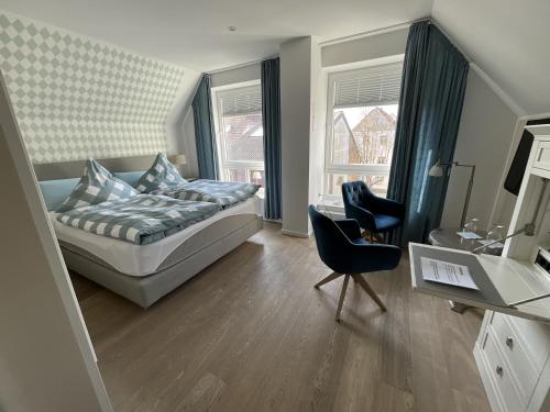 Una cama o camas en una habitación de Zeit in Eckernförde