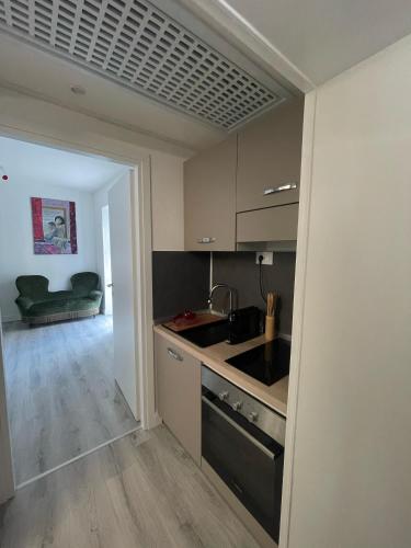 Kuchyň nebo kuchyňský kout v ubytování Casa Flavia-Residenza nel cuore di Ariccia