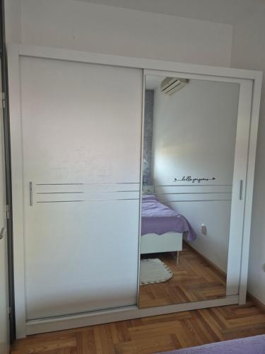 Postel nebo postele na pokoji v ubytování Moni
