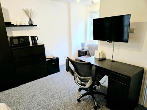 TV a/nebo společenská místnost v ubytování Deluxe Room with Private En Suite in South Croydon