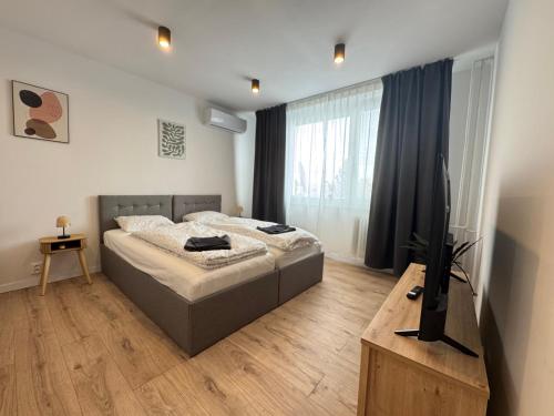 Postel nebo postele na pokoji v ubytování Apartmán Michalovce so súkromným parkingom
