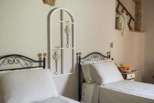 Letto o letti in una camera di Agriturismo La Fonte
