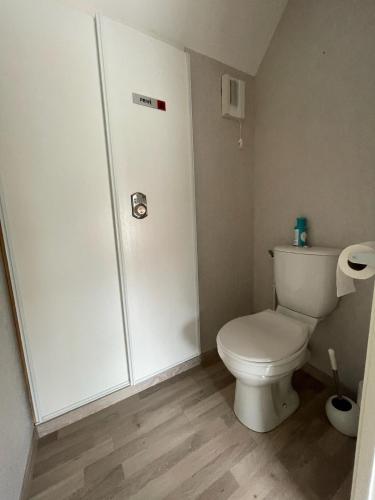 a bathroom with a toilet and a shower at Modern and Bright home walk to beach with garage in Berck-sur-Mer