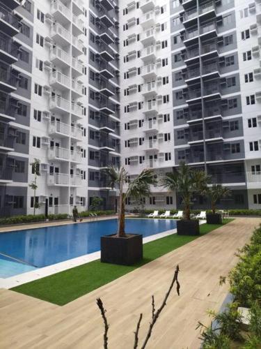 Bazén v ubytování New SMDC Style Condo - Iloilo City nebo v jeho okolí