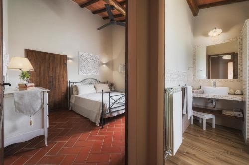 Letto o letti in una camera di Agriturismo La Fonte