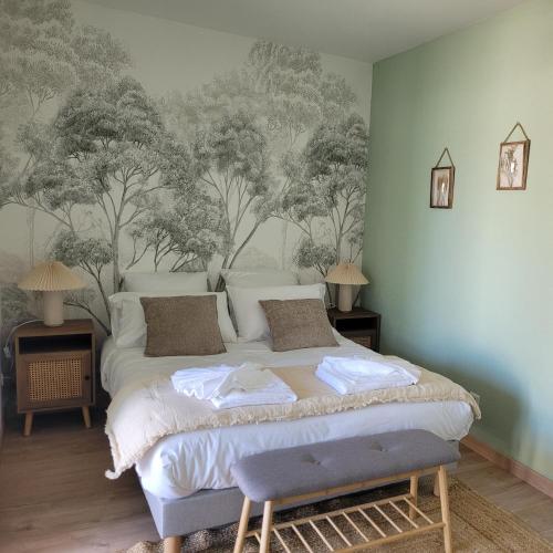 Cama o camas de una habitación en L'écrin fleuri