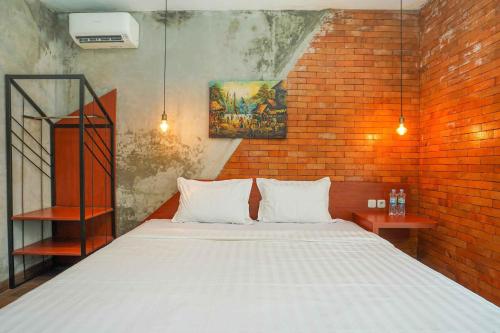 Voodi või voodid majutusasutuse Noesa Heritage toas