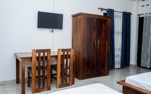Televisyen dan/atau pusat hiburan di Hôtel Identicmg