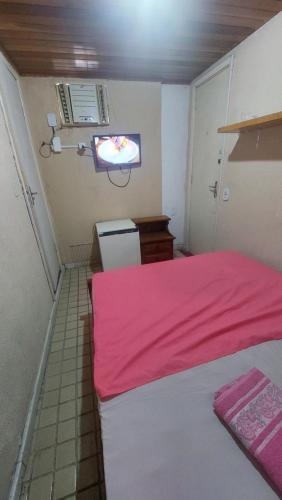 Hostel Bom e Familiarにあるベッド