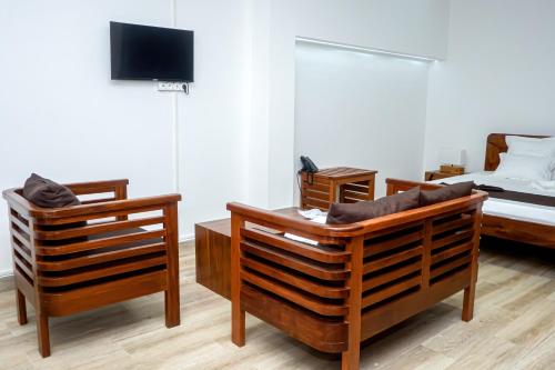 Televisyen dan/atau pusat hiburan di Hôtel Identicmg
