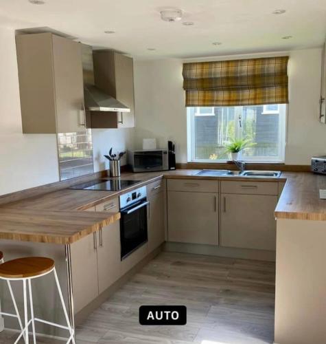 Кухня или мини-кухня в Sunrise Holiday Home Humberston Fitties
