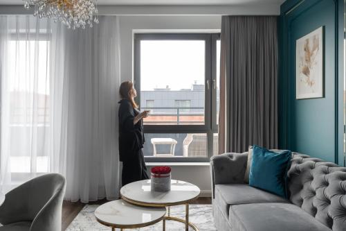 Posezení v ubytování Scala City Center Premium Apartments with Parking by Lion Apartments
