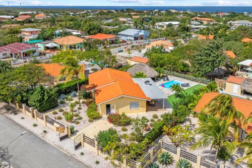 an aerial view of a home with an orange roof at Kas di Rosa Curacao luxurious holiday home in Grote Berg