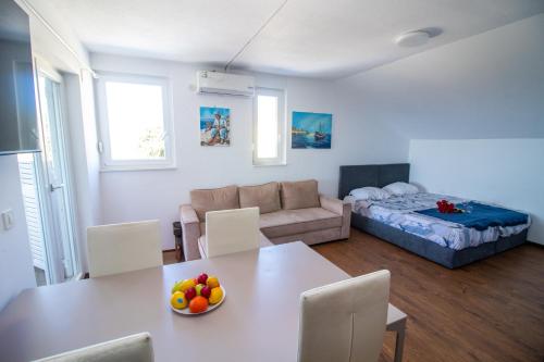 Postel nebo postele na pokoji v ubytování Royal Resort Gajac