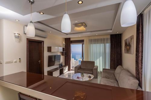 Χώρος καθιστικού στο Deluxe Apartments Shine