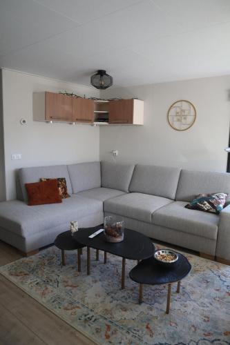Χώρος καθιστικού στο Bosrust & Bubbels - Chalet met hottub in putten