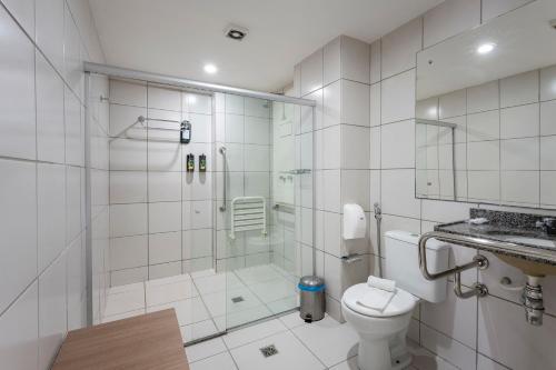 Um banheiro em Villa Park Hotel