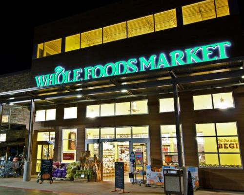 a store with a sign that reads wildlife foods market at G3 central location museums FREE PARKING in Richmond