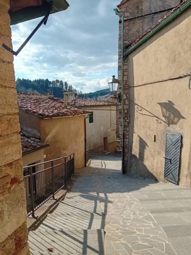 a shadow of a bird on the side of a building at Le finestre sulle stelle in Gerfalco