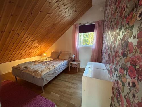 Postel nebo postele na pokoji v ubytování Sjöviken Härnösand
