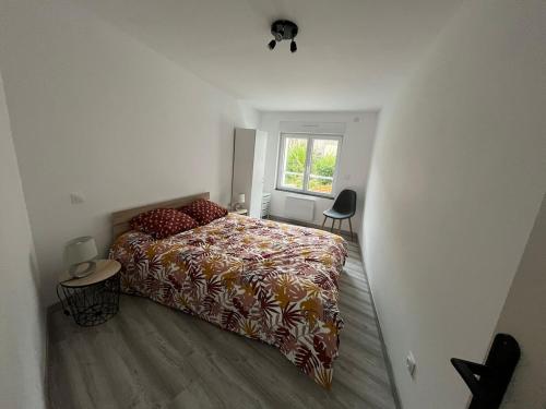 Postel nebo postele na pokoji v ubytování Mon petit coin de Boulogne - Maison avec terrasse