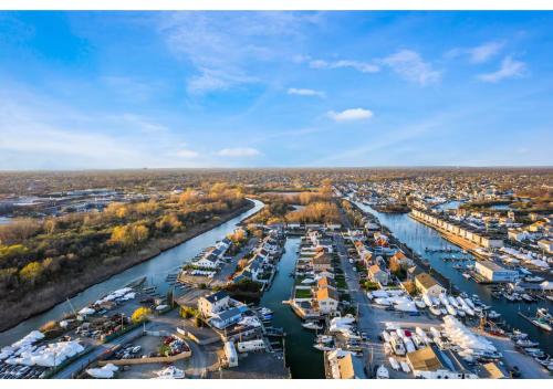 an aerial view of a marina with boats docked at Jones Beach Houseboat in Seaford