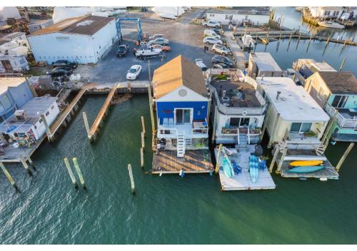 an aerial view of a marina with a house at Jones Beach Houseboat in Seaford