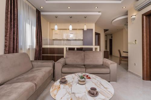 Χώρος καθιστικού στο Deluxe Apartments Shine