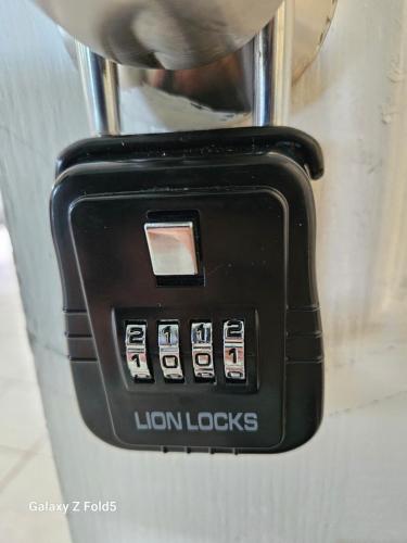 a close up of a door with a black button at Yonegan Maui Getaways - Haiku in Haiku