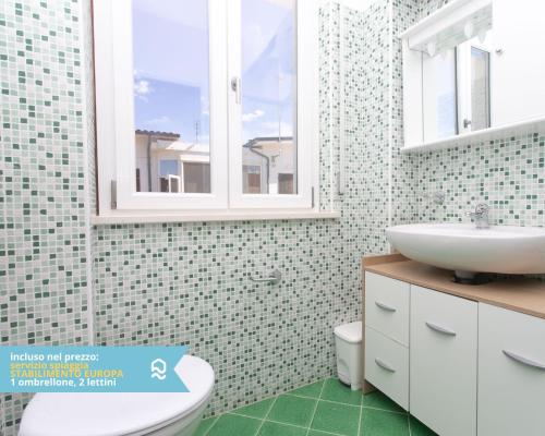 Koupelna v ubytování RS321 - Marcelli, trilocale fronte mare con spiaggia inclusa