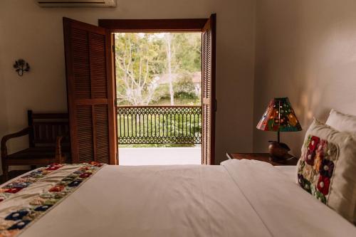 Katil atau katil-katil dalam bilik di Resort Fazenda 3 Pinheiros