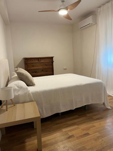 A bed or beds in a room at TESORO