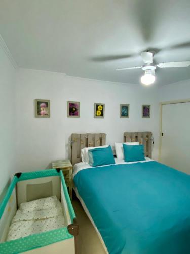 a bedroom with two beds and a ceiling at Casa Elena in Candelaria