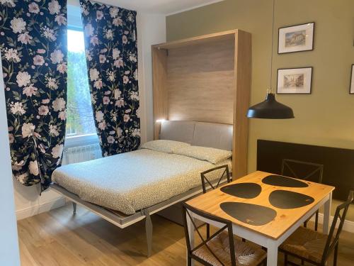 A bed or beds in a room at Dimora del Papa apartments