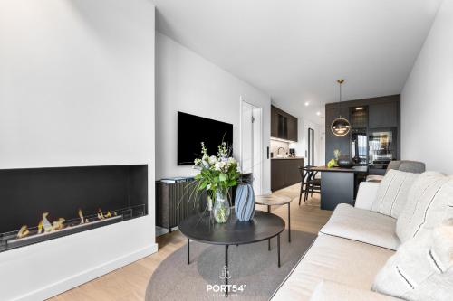 TV a/nebo společenská místnost v ubytování Turtle Bay Suite List auf Sylt