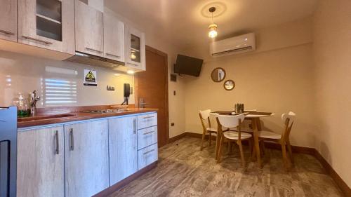 Entre Cumbres Apart Hotelにあるキッチンまたは簡易キッチン