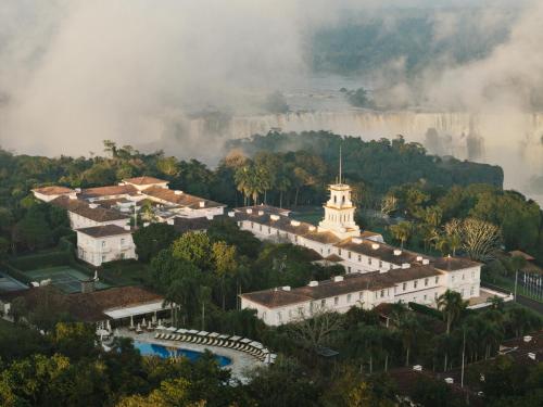 an aerial view of the palace of the americas with the niagaraowmentowment at Hotel das Cataratas, A Belmond Hotel, Iguassu Falls in Foz do Iguaçu
