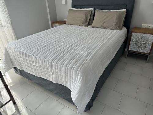 Ένα ή περισσότερα κρεβάτια σε δωμάτιο στο Sofia Rooms