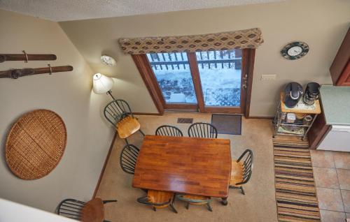 an overhead view of a dining room with a table and chairs at Rippling Waters close to Timberline ski slopes in Cortland