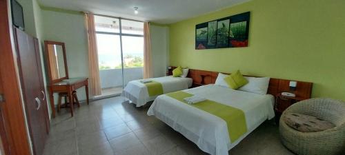 Postel nebo postele na pokoji v ubytování Aparthotel Bernabeth