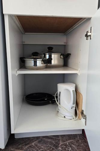 Η κουζίνα ή μικρή κουζίνα στο Motel Cap Blanc