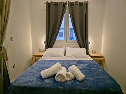 Ένα ή περισσότερα κρεβάτια σε δωμάτιο στο Fira gem luxury apartment