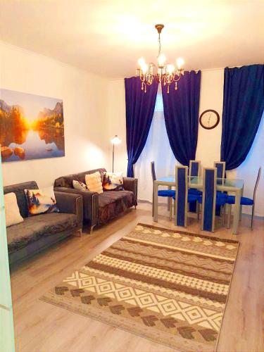 Khu vực ghế ngồi tại Family Apartments Neunkirchen - 3 room's Apartment 4