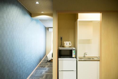 Кухня или мини-кухня в Shiki Suites - Vacation STAY 22189v
