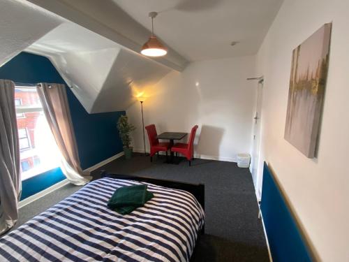 Ένα ή περισσότερα κρεβάτια σε δωμάτιο στο bnb
