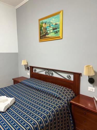 Postel nebo postele na pokoji v ubytování Vertex Suite